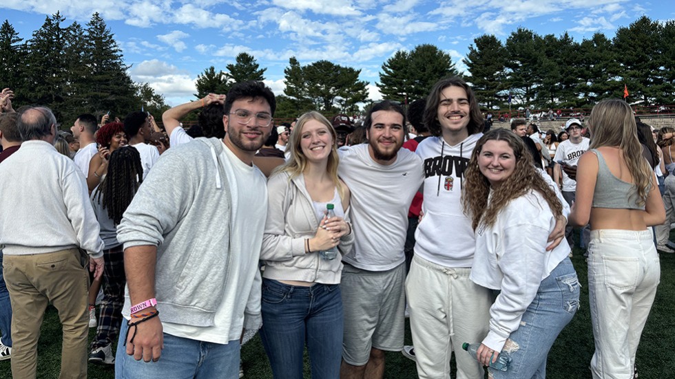 several people posing for a photo